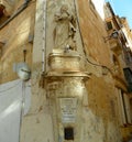 Malta, Valletta, figures built into the corners of the buildings Royalty Free Stock Photo