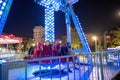 Turkish children having fun in amusement park ride at night time in a summer day for entertainment having fun leisure time