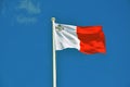 Maltese flag on blue sky Royalty Free Stock Photo