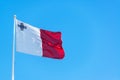 Maltese Flag and Blue Sky Royalty Free Stock Photo