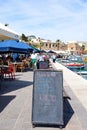 Menu board on the quayside, Marsaxlokk.