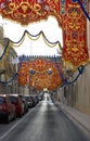 Maltese street decorated on religious feast time. Paola, Malta
