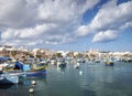 Maltese traditional painted luzzu boats in marsaxlokk fishing vi Royalty Free Stock Photo