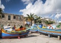 Maltese traditional painted luzzu boats in marsaxlokk fishing vi Royalty Free Stock Photo