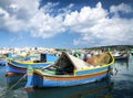 Maltese traditional painted luzzu boats in marsaxlokk fishing vi