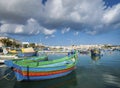 Maltese traditional painted luzzu boats in marsaxlokk fishing vi Royalty Free Stock Photo