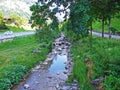 The Malunbach stream between the alpine villages of Steg and Malbun in the Liechtenstein Alps - Steg, Liechtenstein Royalty Free Stock Photo