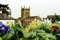 Malvern Priory out of focus with flowers in the foreground Royalty Free Stock Photo