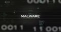 Malware text animation over digital code and binary numbers background