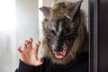 Mam with wolfwere mask. Halloween costume