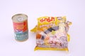 Mama brand instant noodles and canned fish in tomato sauce