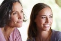 Mama, girl and love thinking and care outside, mothers day with generations spending time together in nature for bond Royalty Free Stock Photo