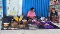 Mama sells Papuan traditional equipment