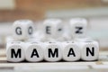 Maman, dice letters