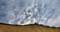 Mammatus unusual clouds marsupial, called Mastoid, umeshaped on sky over over the cliff