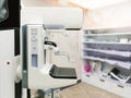 Mammography machine with monitor for breast screening device on mammogram room background