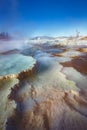 Mammoth Hot Springs with steamy terraces during winter snowy season in Yellowstone National Park, Wyoming