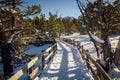 Mammoth Hot Springs trail with steamy terraces during winter snowy season in Yellowstone National Park, Wyoming Royalty Free Stock Photo