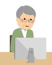 Elderly man operating a pc