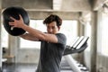 man abdomen exercise with hard ball in gym Royalty Free Stock Photo