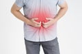 Man with abdominal pain, stomach ache on gray background Royalty Free Stock Photo