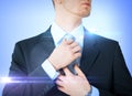 Man adjusting his tie Royalty Free Stock Photo