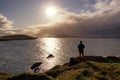 Man admiring sunset over Blasket island
