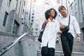 Man with afrian american woman together in the city outdoors Royalty Free Stock Photo