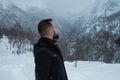 Man against view of Naeroydalen valley from road Stalheimskleiva, Norway