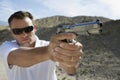 Man Aiming Hand Gun Royalty Free Stock Photo