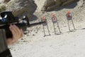 Man Aiming Machine Gun At Firing Range