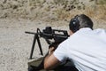 Man Aiming Machine Gun At Firing Range Royalty Free Stock Photo