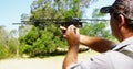 Man aiming with telemetry antenna