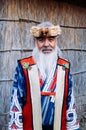 A man in Ainu tradition tribal costume at Shiraoi Ainu Museum H Royalty Free Stock Photo