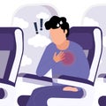 Man in the airplane suffering from panic attack, fast heartbeat, sweating and trembling.