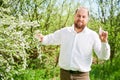 Man allergic using medical nasal drops, suffering from seasonal allergy at spring Royalty Free Stock Photo