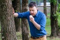 Man with allergy or ill with hay fever sneezing and cleaning nos Royalty Free Stock Photo