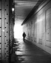 Man alone in freeway underpass Royalty Free Stock Photo