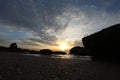 Man alone in the sea lonely feeling sunset time Royalty Free Stock Photo