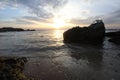 Man alone in the sea lonely feeling sunset time Royalty Free Stock Photo