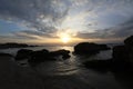 Man alone in the sea lonely feeling sunset time Royalty Free Stock Photo