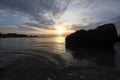 Man alone in the sea lonely feeling sunset time Royalty Free Stock Photo