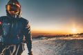 Man alpinist climbing in mountains greet the dawn