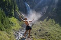 Man in Alps waterfall. Sexy man. Man freedom lifestyle. Meditating in nature. Hispanic man practicing yoga. Lifestyle