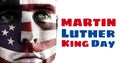 Man with american flag face paint by martin luther king day text on white background Royalty Free Stock Photo