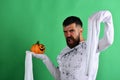 Man with angry face expression on green background. Halloween character Royalty Free Stock Photo