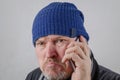 A man is angry while talking on his cell phone Royalty Free Stock Photo