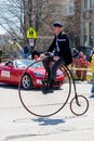 Man on a antique bicycle