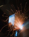 A professional welder, welding the top on a pressure vessel Royalty Free Stock Photo