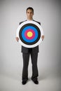 Man with archery target